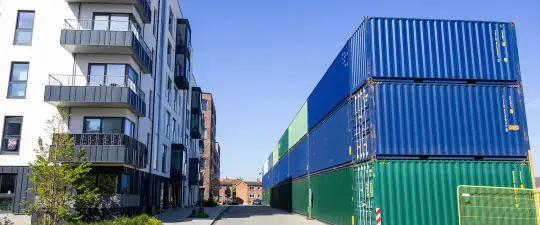 Containermur i beboelsesområde